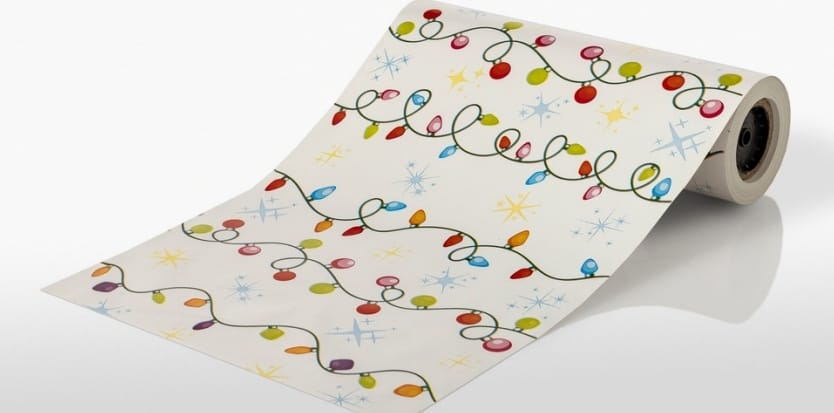 Papel de regalo rojo con líneas doradas